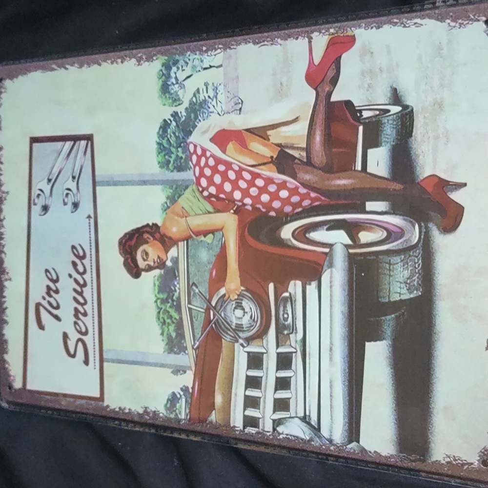 Pinup Tirestore sign